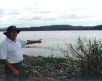 Photo of Phil Renouif pointing to where James Craig lay in Recherche Bay, Tasmania